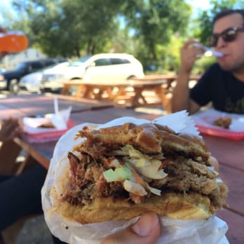 Eli's BBQ - Riverside - Dirty pulled pork sandwich with coleslaw on top. - Barbeque Near Me - Cincinnati, Ohio Eli's BBQ - Riverside - Dirty pulled pork sandwich with coleslaw on top. - Barbeque Near Me - Cincinnati, Ohio