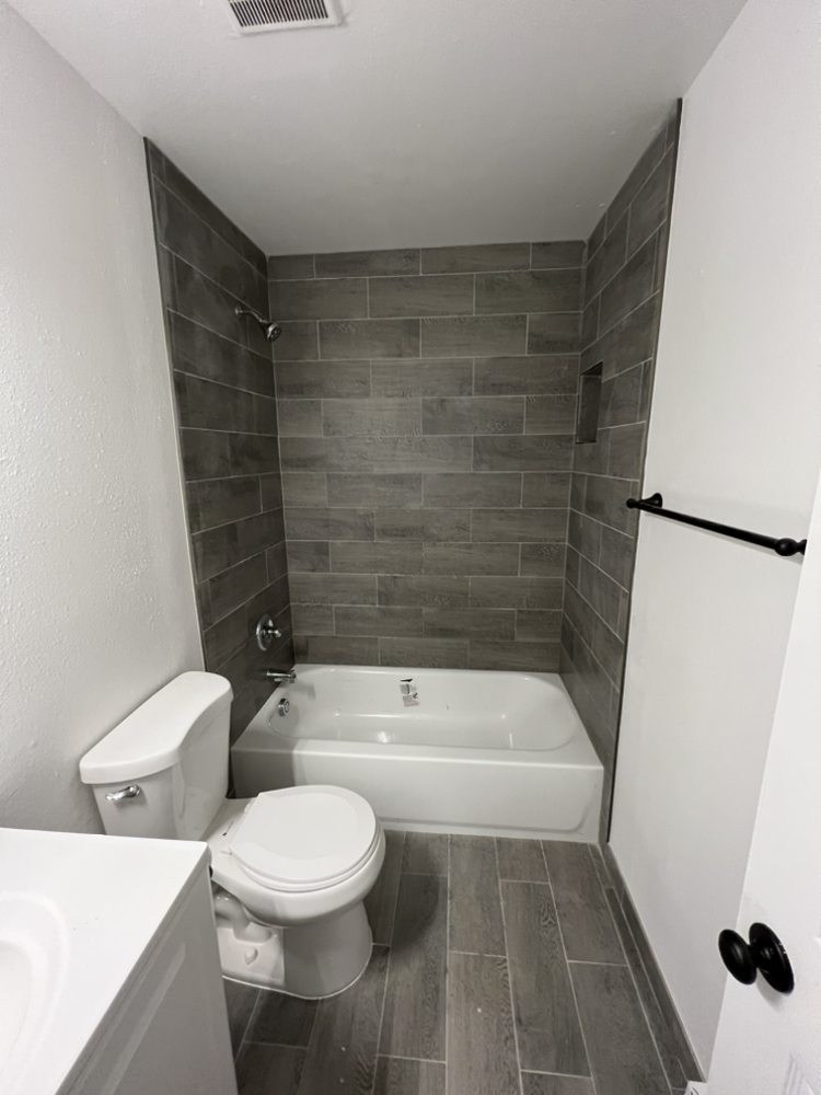 Slide of Portlandia Plumbing Works