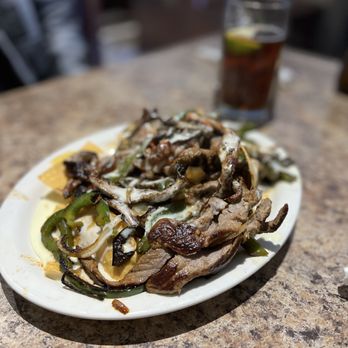 Los Potros - a plate of food on a table - Mexican Near Me - Ooltewah, Tennessee Los Potros - a plate of food on a table - Mexican Near Me - Ooltewah, Tennessee