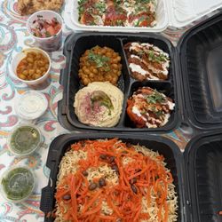 Afghan Kabob - From top Mantu, chef sampler appetizer( hummus, chick peas, eggplant  badimjan, sauash) qabuli palov absolutely delicious