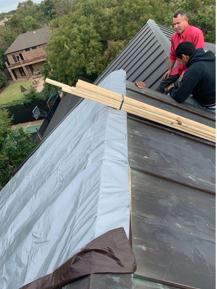 Slide of CZ Roofing Systems and Construction