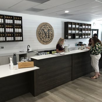 Monserate Winery - Tasting room bar. Candy poured for us. - Wineries Near Me - Fallbrook, California