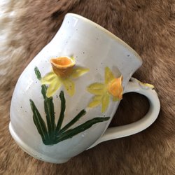 Helen Arts & Heritage Council - Wheel thrown mug with 3-D daffodils