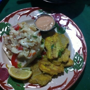 El Eden Restaurant - Sword fish with seafood stuffing (real crabmeat, shrimp, lobster meaty and mozzarella cheese) with a  side of tostones - Beer, Wine & Spirits Near Me
