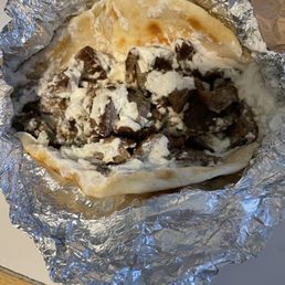 Gyro with expired sauce and no tomatoes or onion. YUK