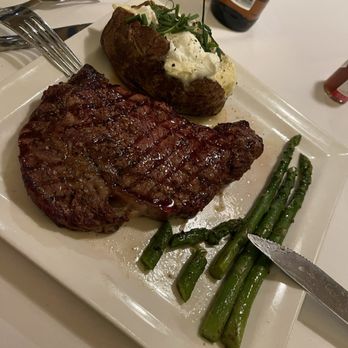 Moonshadow Grille - Ribeye with baked potato and asparagus - Steakhouses Near Me - Laughlin, Nevada
