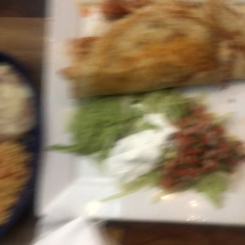 Las Trojas Cantina - (My apologies for how blurry it is) Shrimp quesadilla with pico, avocado, etc on the side - Mexican Near Me - Madison, Alabama