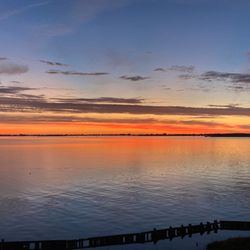 Pirate's Cove Realty - Sunset facing over the sound from one of our properties decks.
