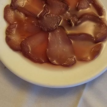 LA Paella - Dessert. Poached pear in wine and sugar syrup. Made in house - Spanish Near Me - Los Angeles, California