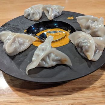 Himalayan wild yak - Momos with yak meat interior...delicious, thin dough.  Flavorful sauce. - Himalayan/Nepalese Near Me - Ashburn, Virginia