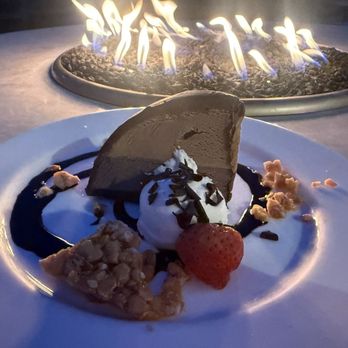 Roy's at Pebble Beach - Mudslide dessert. Chocolate and Oreos ice cream cake. - Asian Fusion Near Me - Pebble Beach, California Roy's at Pebble Beach - Mudslide dessert. Chocolate and Oreos ice cream cake. - Asian Fusion Near Me - Pebble Beach, California