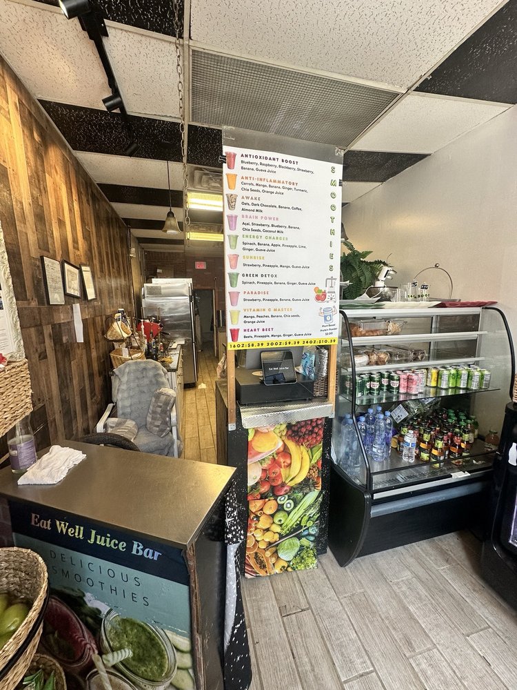 Eat Well Juice Bar Logo