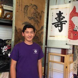 Omid is a student who's learning Chinese & calligraphy in Sugi.