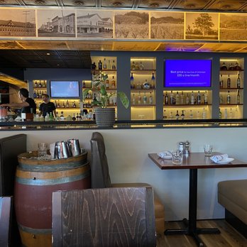 Napkins - The lively moving bottles projected on the screen was replaced with a flat screen TV - New American Near Me - Napa, California Napkins - The lively moving bottles projected on the screen was replaced with a flat screen TV - New American Near Me - Napa, California