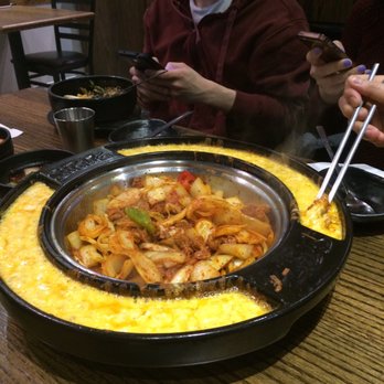Ozen Korea - Pork dish with melted cheese ring - Korean Near Me - London, Ontario Ozen Korea - Pork dish with melted cheese ring - Korean Near Me - London, Ontario