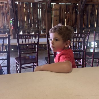Riley's Farm - Grandson patiently waiting on his lunch. - Fruits & Veggies Near Me - Oak Glen, California Riley's Farm - Grandson patiently waiting on his lunch. - Fruits & Veggies Near Me - Oak Glen, California