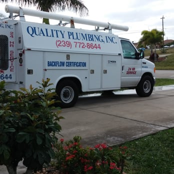 Quality Plumbing - a truck parked in front of a house - Plumbing Near Me - Cape Coral, Florida Quality Plumbing - a truck parked in front of a house - Plumbing Near Me - Cape Coral, Florida