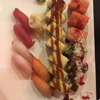 Hamachi 34 - As of 04.23.18. Middle Nomado Roll. Top right Volcano Roll. Bottom right the Chicago roll. The Salmon Sushi roll fatty & delicious . - Japanese Near Me - New York, New York