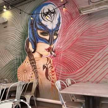 Alatri Bros. - a woman's face painted on a wall - Pizza Near Me - Bethesda, Maryland Alatri Bros. - a woman's face painted on a wall - Pizza Near Me - Bethesda, Maryland