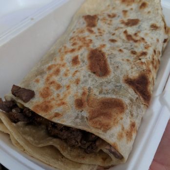 De Kotija Taco Shop - Carne asada burrito. Comes with guac and sour cream normally. Tasty tasty tasty - Mexican Near Me - Chula Vista, California De Kotija Taco Shop - Carne asada burrito. Comes with guac and sour cream normally. Tasty tasty tasty - Mexican Near Me - Chula Vista, California