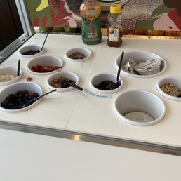 Breakfast toppings (almond slivers incorrectly identified) Breakfast toppings (almond slivers incorrectly identified)