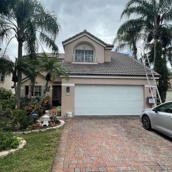 Paul Bange Roofing - Front view of the house, note the detail in the top point of the roof! - Roofing Near Me - Davie, Florida