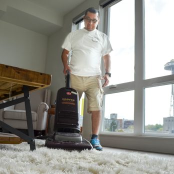 Barrera Cleans - Vacuuming living room rug - Home Cleaning Near Me - Seattle, Washington Barrera Cleans - Vacuuming living room rug - Home Cleaning Near Me - Seattle, Washington