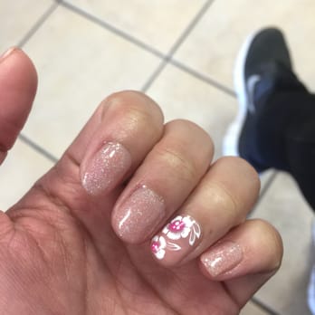 Gilroy Nails - Simple nude & glitter with a beautiful flower accent! - Nail Salons Near Me - Gilroy, California
