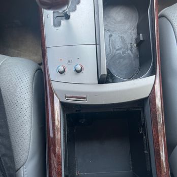 Reflections Automotive Detailing - center console and cup holder after cleaning - Auto Detailing Near Me - Tyrone, Georgia