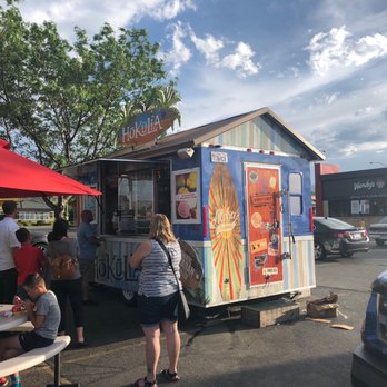 Hokulia Shave Ice - a woman standing in front of a food truck - Shaved Ice Near Me - Herriman, Utah Hokulia Shave Ice - a woman standing in front of a food truck - Shaved Ice Near Me - Herriman, Utah