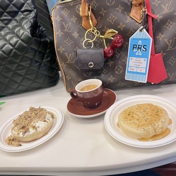 The Crumpet Shop - I think the left crupet was called "Vermont", w maple syrup, nuts, & icing.  Right crumpet w butter & honey. - Bakeries Near Me - Seattle, Washington