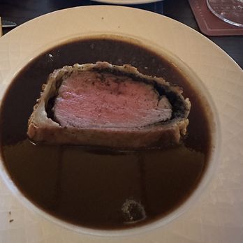 Harry's - Beef Wellington, we spit each course and this is half served with polenta fries. Absolutely delicious! - Seafood Near Me - West Palm Beach, Florida Harry's - Beef Wellington, we spit each course and this is half served with polenta fries. Absolutely delicious! - Seafood Near Me - West Palm Beach, Florida