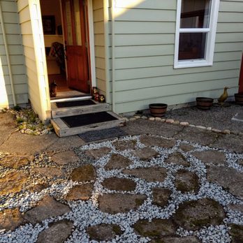 Gatica Lawn Care - He removed the grass from around the stones and added pebbles. - Tree Services Near Me Gatica Lawn Care - He removed the grass from around the stones and added pebbles. - Tree Services Near Me
