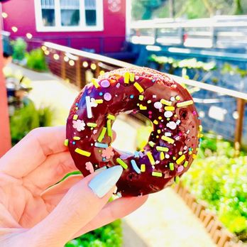 Flour Craft Bakery - Vegan Chocolate Donut with Rainbow Sprinkles - Bakeries Near Me - Mill Valley, California Flour Craft Bakery - Vegan Chocolate Donut with Rainbow Sprinkles - Bakeries Near Me - Mill Valley, California