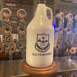 a gallon of beer on a counter