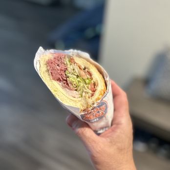 Jersey Mike's Subs - a hand holding a sandwich - Fast Food Near Me - Elk Grove, California Jersey Mike's Subs - a hand holding a sandwich - Fast Food Near Me - Elk Grove, California