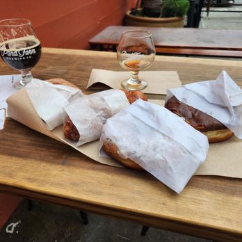 Pond Farm Brewing - Johnny's custard filled cinnamon sugar cronut & the lemon poppyseed glazed donut paired perfectly with the imperial stout and wild sour - Brewpubs Near Me - San Rafael, California