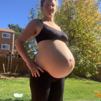 The Peak Experience - A very pregnant woman who is only managing to stand up thanks to the massage work of Emily Kollander of The Peak Experience. - Massage Therapy Near Me - Colorado Springs, Colorado The Peak Experience - A very pregnant woman who is only managing to stand up thanks to the massage work of Emily Kollander of The Peak Experience. - Massage Therapy Near Me - Colorado Springs, Colorado