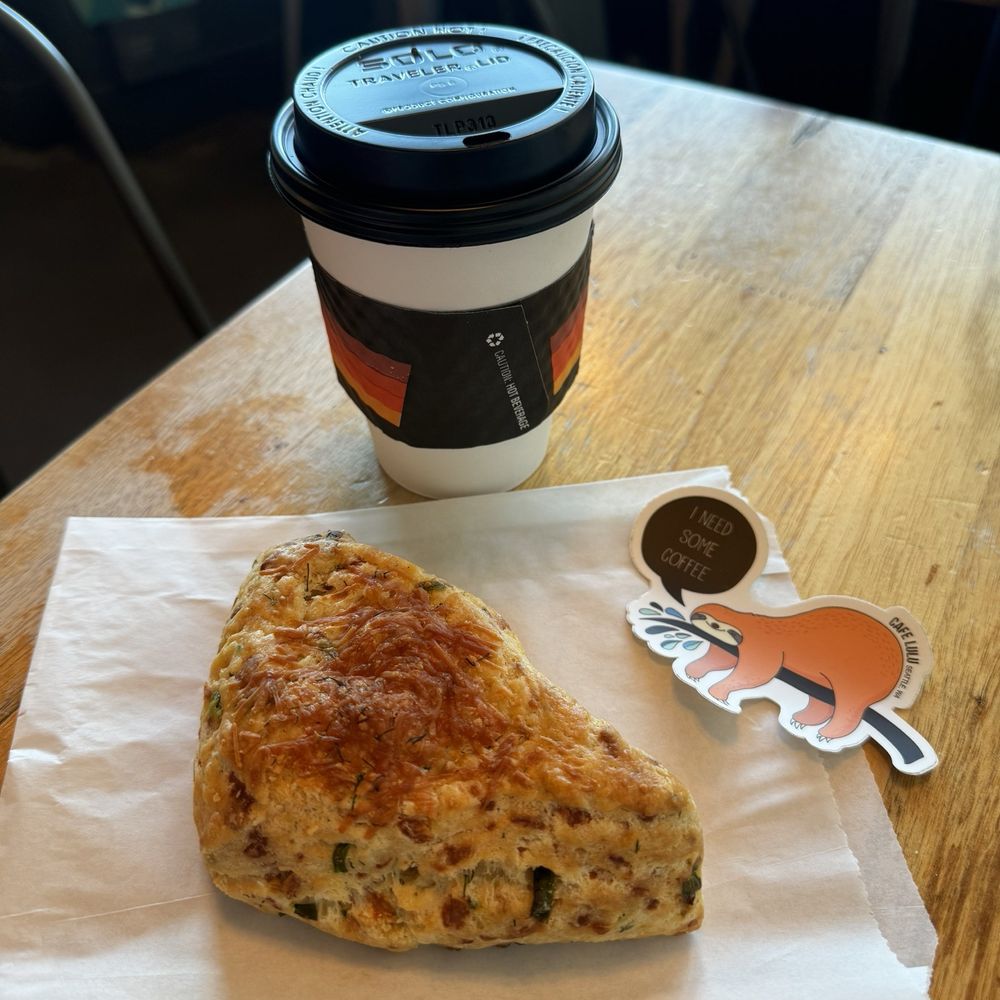 Cafe Lulu - Cocoa pumpkin latte, dill scone, and sticker - Coffee & Tea Near Me - Seattle, Washington