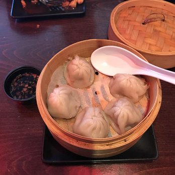 Dumpling Dojo - Soup dumplings served with a side of vinegar ginger sauce - Ramen Near Me - Rutherford, New Jersey