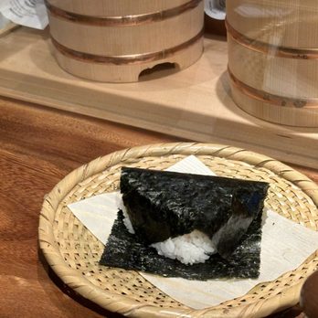Gohan - Mentaiko musubi. Mentaiko surrounded by perfectly cooked rice and wrapped in crispy nori. Oishii! - Japanese Near Me - Honolulu, Hawaii