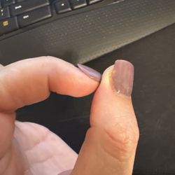 Pure Nail Bar - My left hand the entire dip is lifting -- 2 days after getting done.