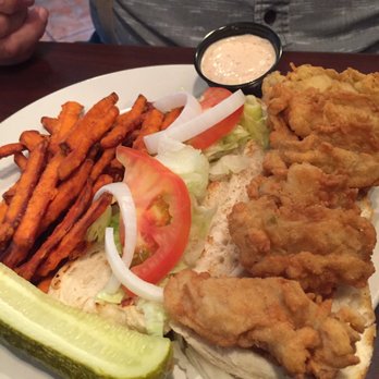 Catch 22 - Oyster poboy with sweet potato fries - Seafood Near Me - Chapin, South Carolina