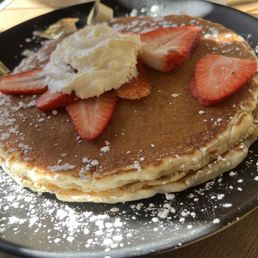 Pancakes with strawberry and whip cream
