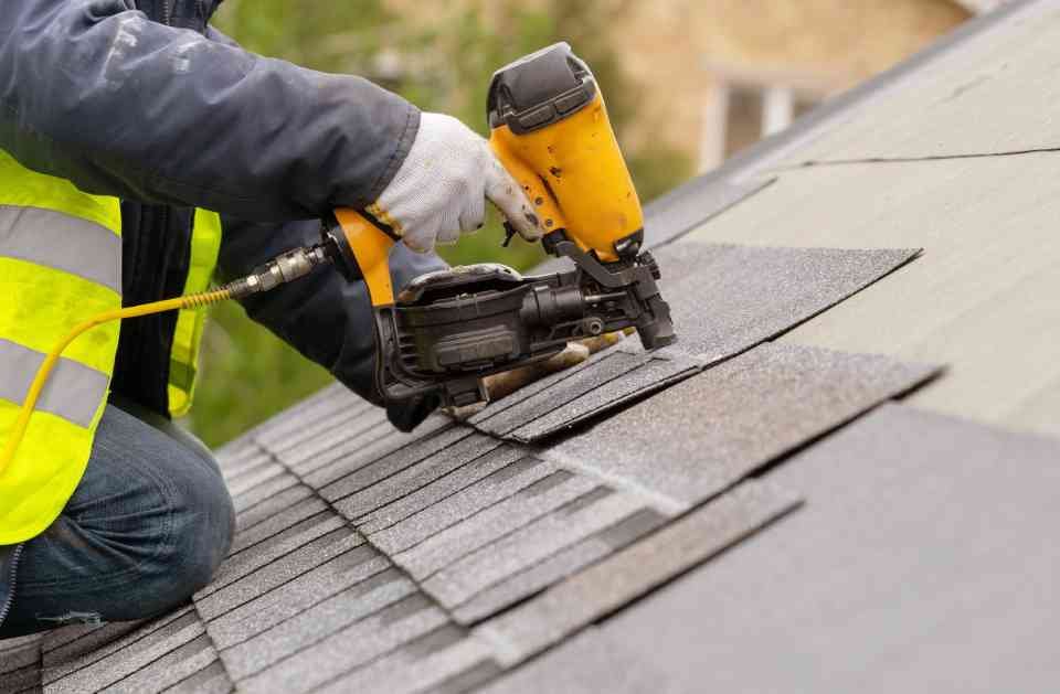 Slide of Two Men Roofing