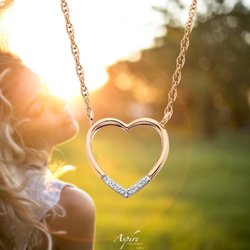 Britton Jewelers - This heart pendant is dainty and simple for everyday wear!