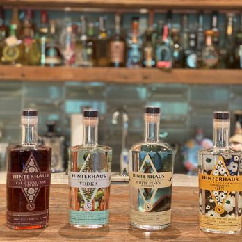 Hinterhaus Distilling - three bottles of gin - Distilleries Near Me - Arnold, California