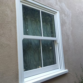 Loewen Window Center - a cat sitting in the window - General Contractors Near Me - Los Angeles, California Loewen Window Center - a cat sitting in the window - General Contractors Near Me - Los Angeles, California