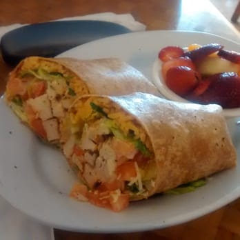Honey's Bistro - Chicken Caesar wrap (tomatoes added) with a side of fruit. - Breakfast & Brunch Near Me - Encinitas, California