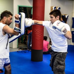 Crom Physical Culture - Brody and Anthony working the Thai pads!